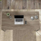 Bureau informatique avec pieds en métal et gestion des câbles