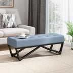 Banc-ottoman en tissu capitonné avec pieds en bois courbé