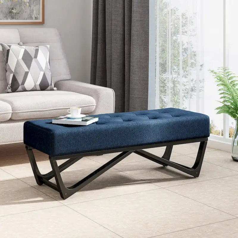 Banc-ottoman en tissu capitonné avec pieds en bois courbé