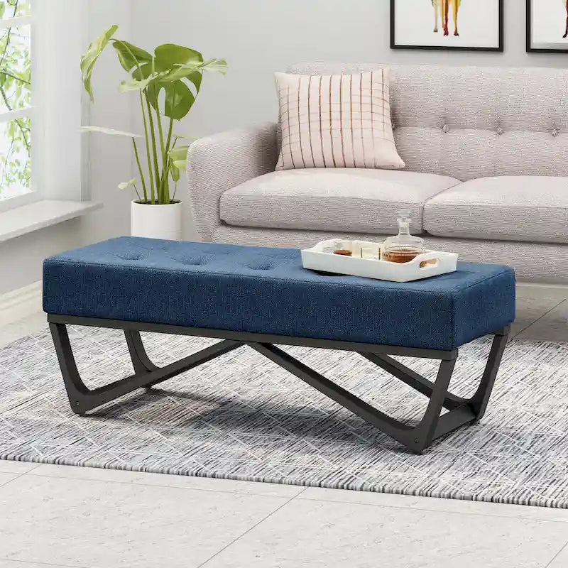 Banc-ottoman en tissu capitonné avec pieds en bois courbé