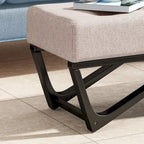 Banc-ottoman en tissu capitonné avec pieds en bois courbé