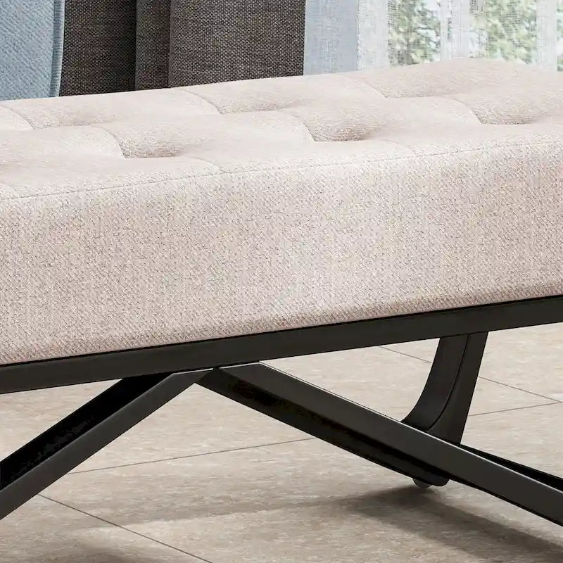 Banc-ottoman en tissu capitonné avec pieds en bois courbé