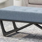Banc-ottoman en tissu capitonné avec pieds en bois courbé