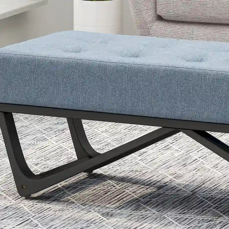 Banc-ottoman en tissu capitonné avec pieds en bois courbé