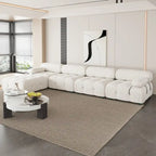 Canapé d'angle en velours avec pouf