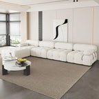 Canapé d'angle en velours avec pouf