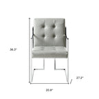 HomeRoots Lot de deux chaises de salle à manger avec accoudoirs, en similicuir touffeté gris clair et argent métallisé